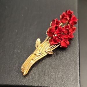 Elegant Gold and Red Floral Brooch